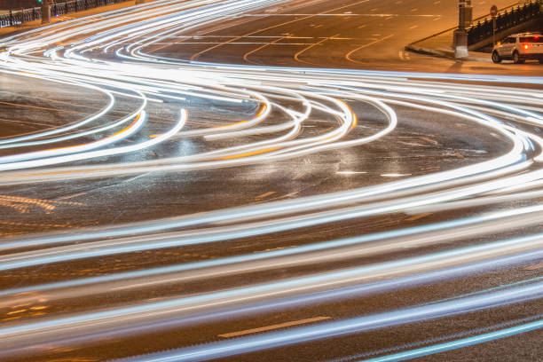 istock Car lights on the street. 1335478852