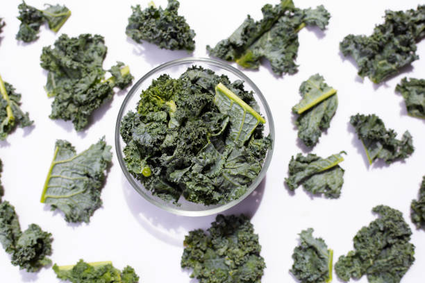 istock Kale leaves on white background. Top view 1335481018