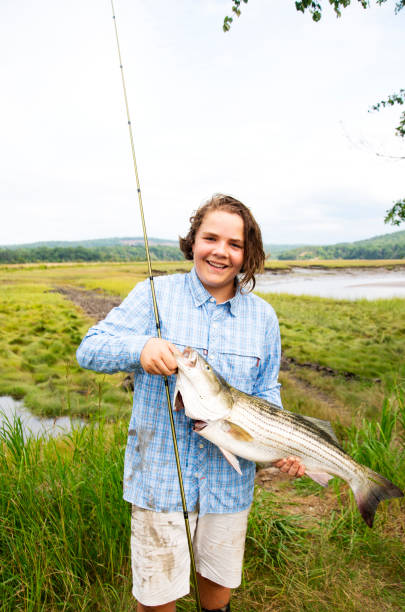 910+ Fishing Child Pre Adolescent Child Fish Stock Photos