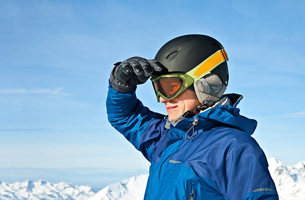 istock man looking at the horizon in snowy mountains 133548534