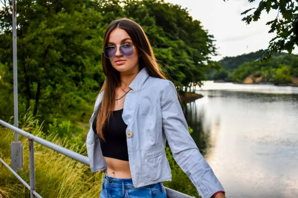 istock Young Woman in Forest Area 1335490731
