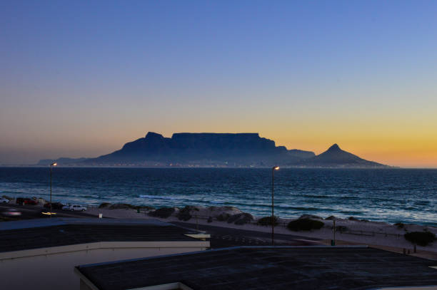 istock Cape town and table mountain sunset at Bloubergstrand 1335493964