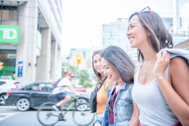 istock Young women walking in the city 1335494864