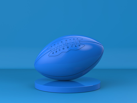 3d rendering blue rugby ball on blue background