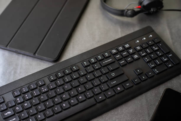 istock Hands Pointing Pressing Computer Keyboard Enter Keys Typewriting New Ideas With Headphones Tablet. Fingers Tapping Typing Fresh Thoughts Using Wireless Notebook Keypad. 1335500337