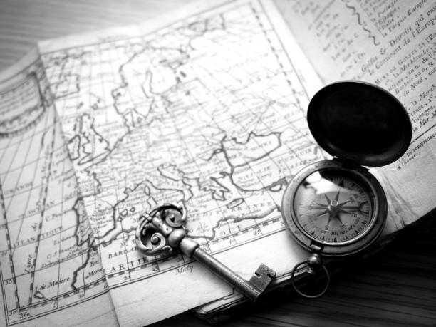 OLYMPUS DIGITAL CAMERAOld map and compass of Europe. I am using an antique atlas (public domain) published in the 18th period.