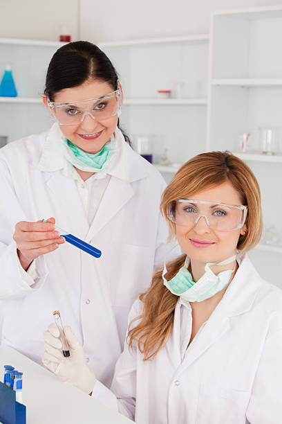 istock Female scientists with safety glasses looking at the camera 133552081