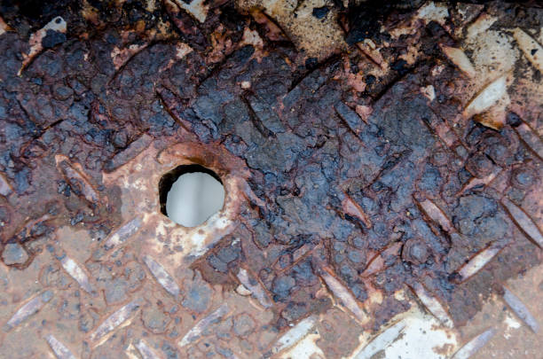 Dirty old iron texture on the floor. City of Cachoeira, Bahia, Brazil.