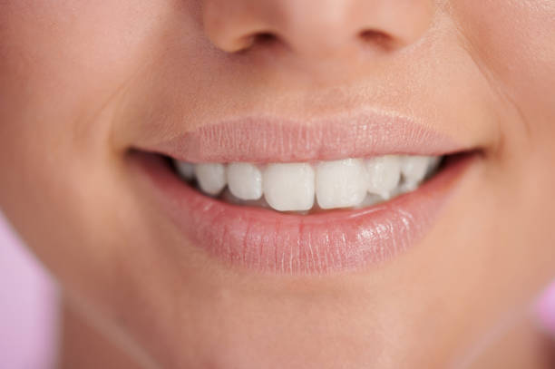 istock Close up of smile with teeth 1335526834