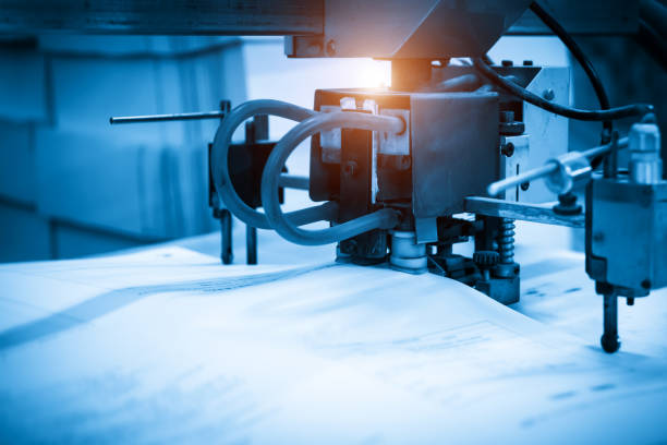 istock The printing press is working in the printing workshop 1335535475