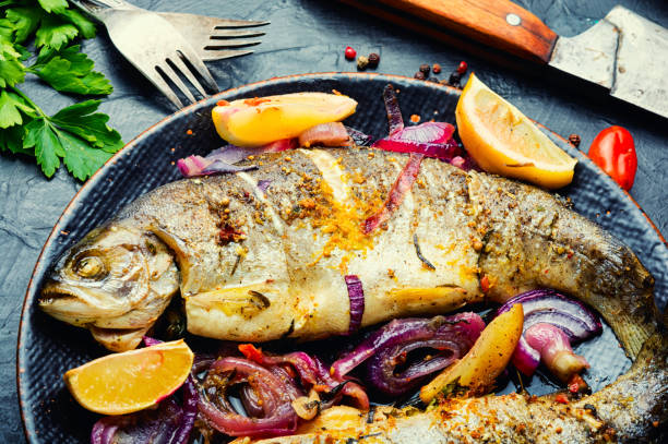 istock Whole baked rainbow trout. 1335542563