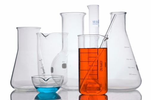 Glassware in a laboratory, over a white background.