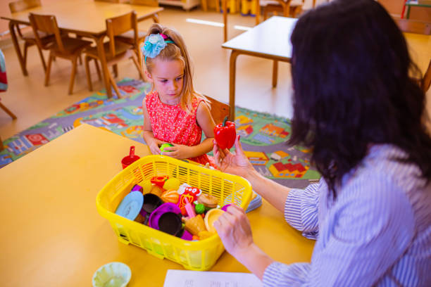 istock Their curious and creative mind can make anything they imagined and teacher is there to help them 1335546038