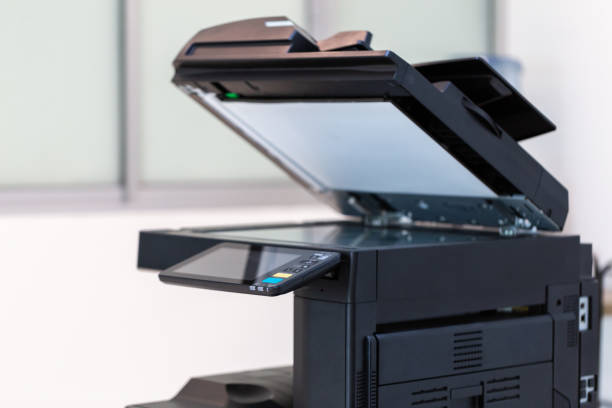 istock photocopier or network printer is office worker tool equipment for scanning and copy paper. 1335551924