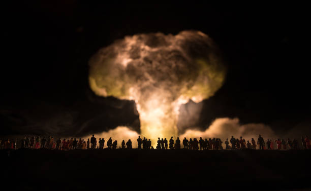 istock Nuclear war concept. Explosion of nuclear bomb. Creative artwork decoration in dark. 1335552261
