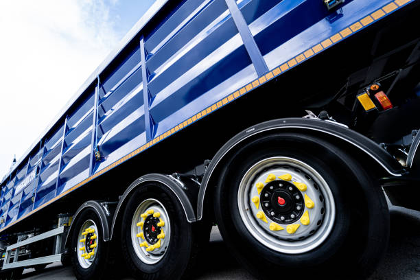 istock Large grain truck at the blue sky background 1335557985
