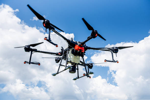 istock Professional agriculture drone flying in the blue sky 1335558254