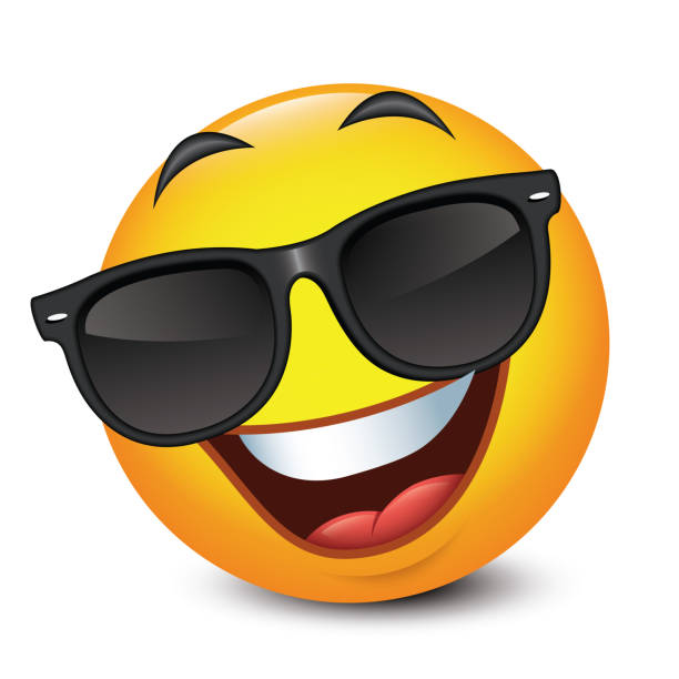 istock Cute smiling emoticon wearing black sunglasses, emoji - vector illustration 1335558511