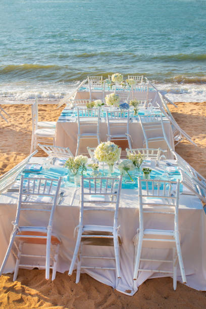 istock Beautifully arranged seaside wedding table and chairs set. 1335564954