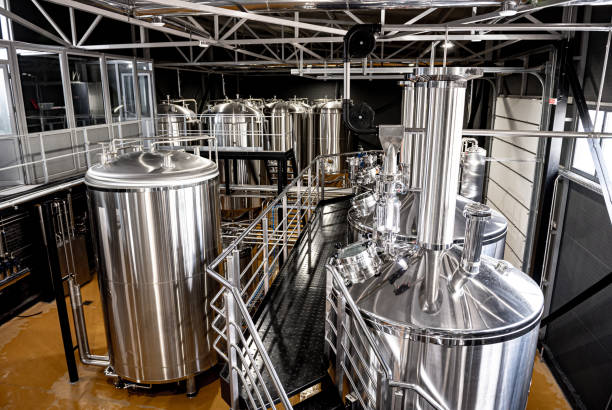 istock Craft beer brewing equipment in privat brewery 1335566753