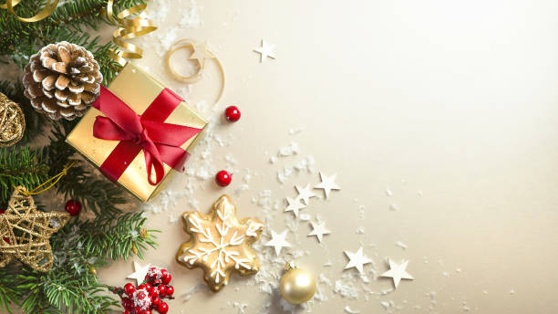 istock Christmas light gold background with gifts. 1335591338