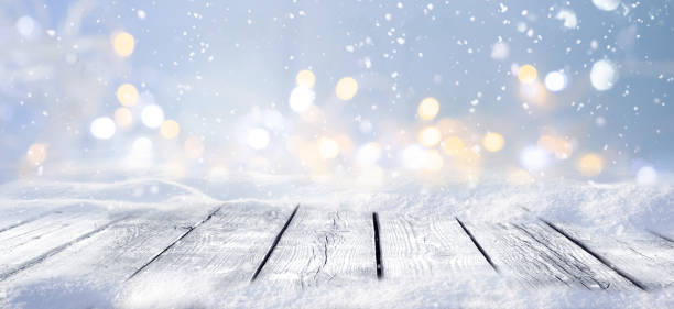 istock Winter snowy stage background with wooden flooring. 1335592468