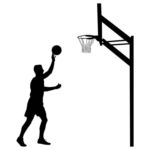 istock Silhouette of a basketball player on a white background 1335623777
