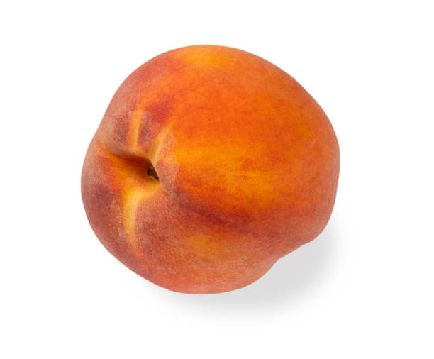 Yellow-orange peach isolated on a white background