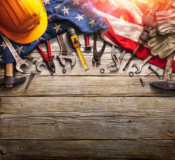 Labor Day - National Holiday - Mechanic Tools And Usa Flag On Woden Background stock photo