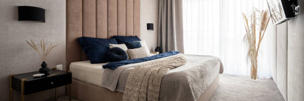 istock Elegant and comfortable bedroom, panorama 1335661096
