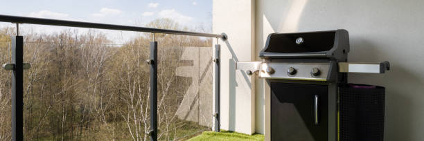 istock Modern gas grill on terrace, panorama 1335661104