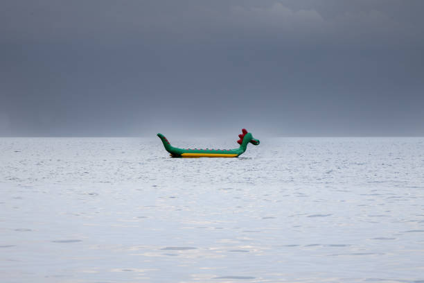 Vacant Inflatable water attraction in the sea against the background of dark sky. High quality photo