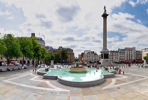 London, UK - Aug 19 2021: Nelson's Column dedicated to Admiral Horatio Nelson, who died at the Battle of Trafalgar in 1805, it's constructed between 1840 and 1843 to a design by William Railton