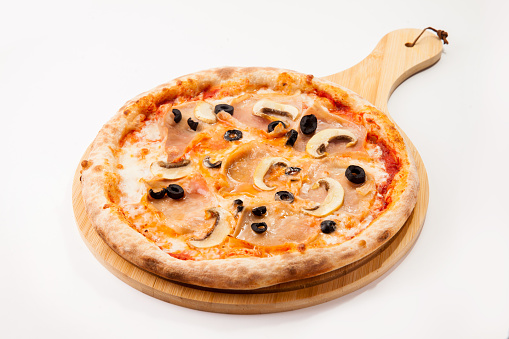pizza on wood plate on white background