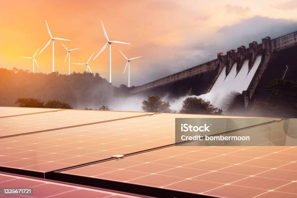 Electricity From Solar Panels Dams And Wind Turbines Environmentallyfriendly Renewable Energy Concept Stock Photo - Download Image Now