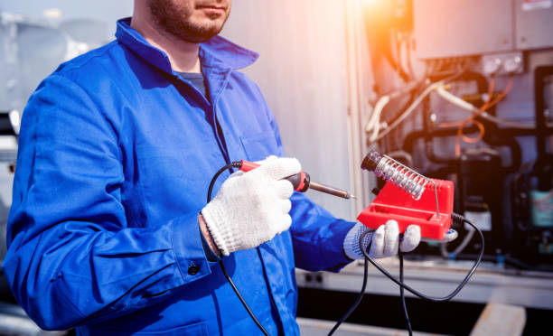 istock The technician repair electronic temperature sensors with an electronic soldering iron 1335672371