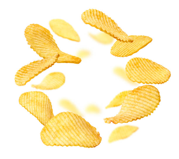 istock Fluted potato chips levitate on a white background 1335676194