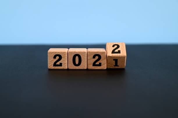 istock 2022 and 2021 Numbers on Wood Blocks New Year Concept 1335677483
