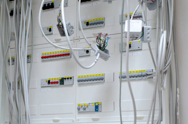 istock Electric installation work. Connecting wires to the switchboard 1335680178