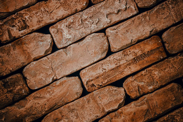 istock Brick wall close-up. Abstract red brick background 1335681546