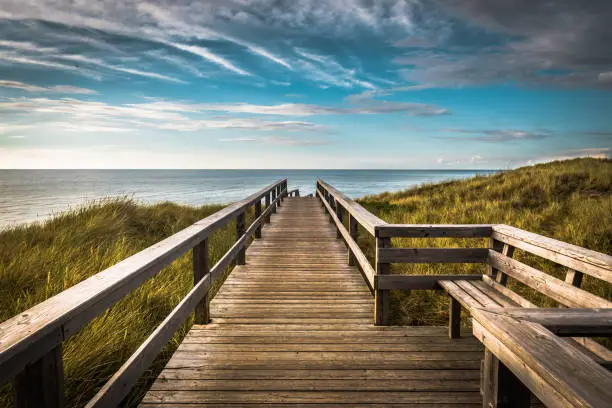 A wooden walking path in Wenningstedt on the german island of Sylt, North Sea