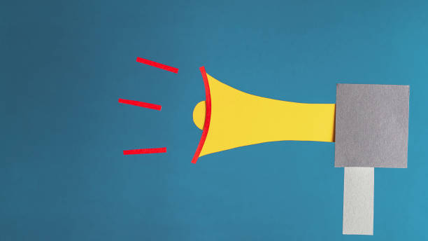 istock Megaphone on blue background, flat lay. Marketing and advertising concept 1335686885