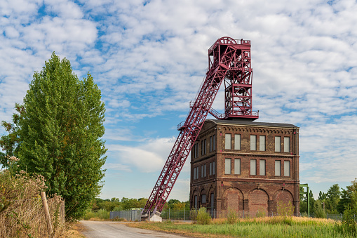 Oberhausen, North Rhine-Westfalia, Germany - July 30, 2018: Clouds over a historic mining tower