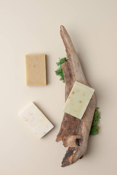 istock Soap and wood on beige background. Flat lay, copy space. 1335694110