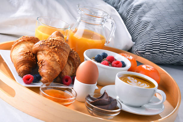 istock A tray with breakfast on a bed in a hotel room 1335697257
