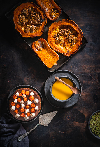 Pumpkin chocolate cake an butternut squash soup with roasted pumpkin tray a perfect autumn meal food