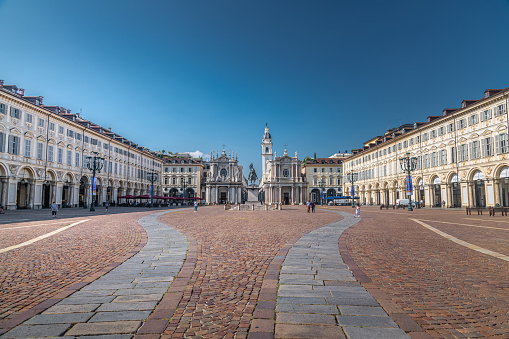 Turin, Italy - 29.07.2021:The twin seventeenth-century churches of Santa Cristina and San Carlo Borromeo face the Piazza San Carlo, one of the main city squares in Turin.