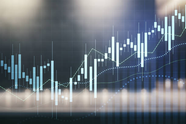 istock Abstract virtual financial graph hologram on blurry modern office building background, forex and investment concept. Multiexposure 1335707517