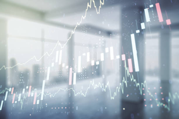istock Double exposure of abstract creative financial chart hologram on empty modern office background, research and strategy concept 1335707553