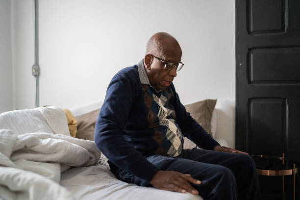istock Senior man waking up at home 1335708943